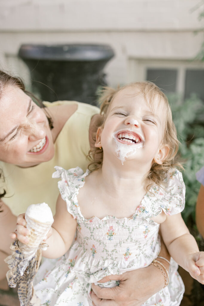 A close-up of a child's face covered in ice cream in a summer family photo session in Northern Virginia.