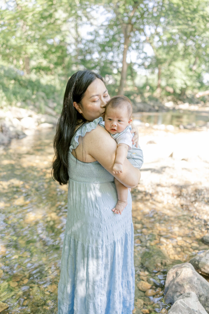 Mom and baby cool off in the creek at a Northern Virginia park.