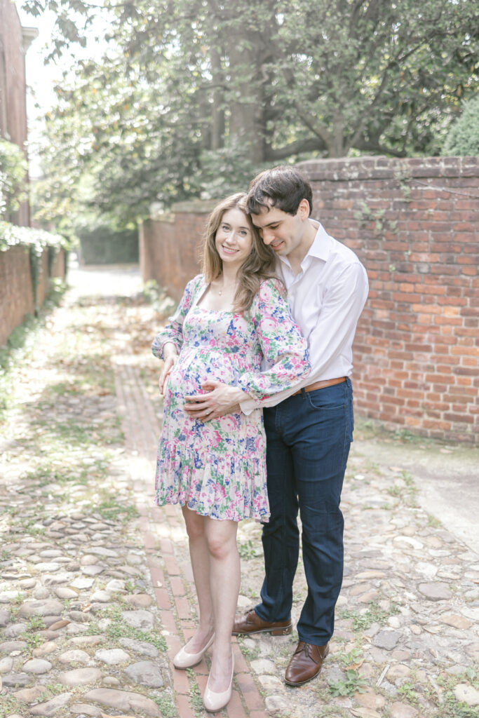 Pregnant mother smiling during lifestyle family photography session