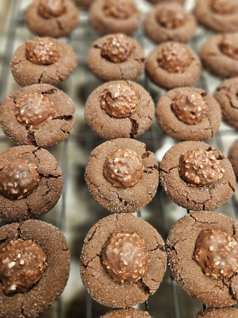 Baking cookies together is one of the meaningful holiday traditions for families, creating cozy memories and festive treats.