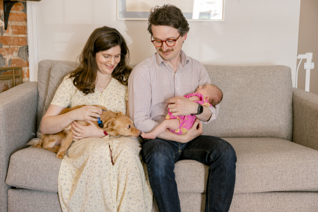 Lifestyle newborn session with dog and baby in Washington DC home